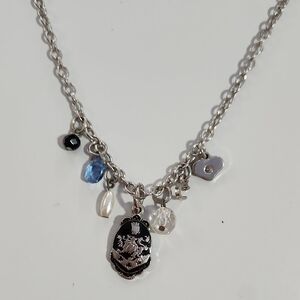 Silver Charm Necklace with Black and Blue Accents